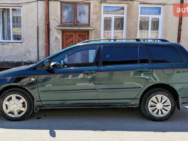 Зелений Тойота Королла, об'ємом двигуна 2 л та пробігом 460 тис. км за 3700 $, фото 1 на Automoto.ua