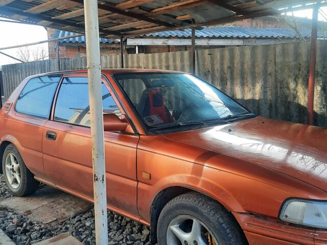 Оранжевый Тойота Королла, объемом двигателя 1.3 л и пробегом 290 тыс. км за 1000 $, фото 1 на Automoto.ua