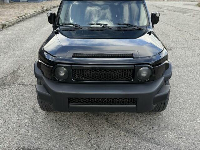 Черный Тойота ФЖ Крузер, объемом двигателя 4 л и пробегом 240 тыс. км за 19800 $, фото 1 на Automoto.ua