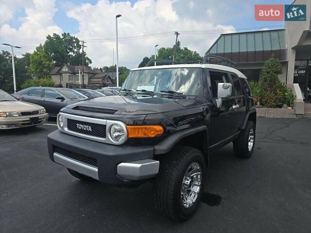 Черный Тойота ФЖ Крузер, объемом двигателя 4 л и пробегом 177 тыс. км за 16000 $, фото 1 на Automoto.ua