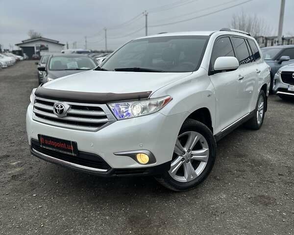 Белый Тойота Хайлендер, объемом двигателя 3.46 л и пробегом 199 тыс. км за 18000 $, фото 1 на Automoto.ua