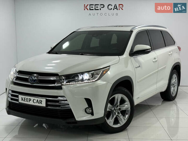 Белый Тойота Хайлендер, объемом двигателя 3.46 л и пробегом 100 тыс. км за 34000 $, фото 1 на Automoto.ua