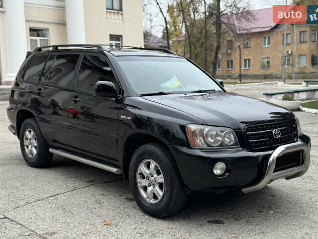 Чорний Тойота Хайлендер, об'ємом двигуна 3 л та пробігом 320 тис. км за 7400 $, фото 1 на Automoto.ua