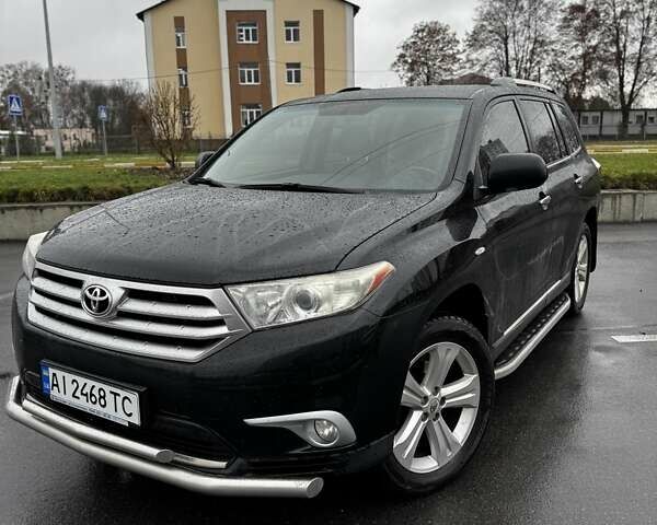 Черный Тойота Хайлендер, объемом двигателя 3.46 л и пробегом 320 тыс. км за 15600 $, фото 1 на Automoto.ua