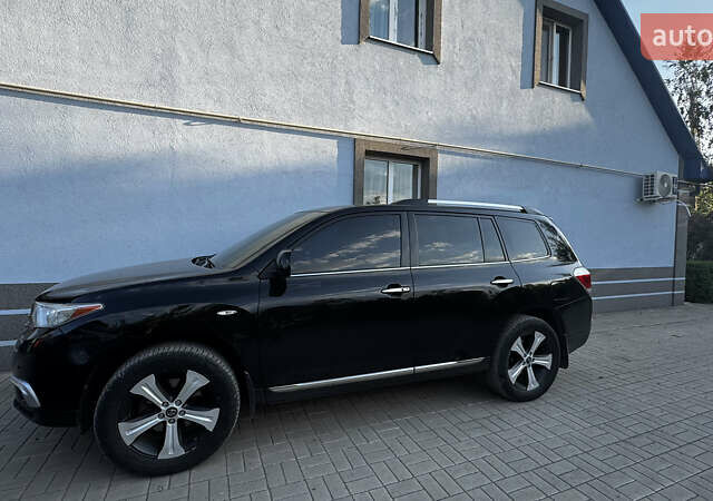 Черный Тойота Хайлендер, объемом двигателя 3.46 л и пробегом 156 тыс. км за 19000 $, фото 1 на Automoto.ua
