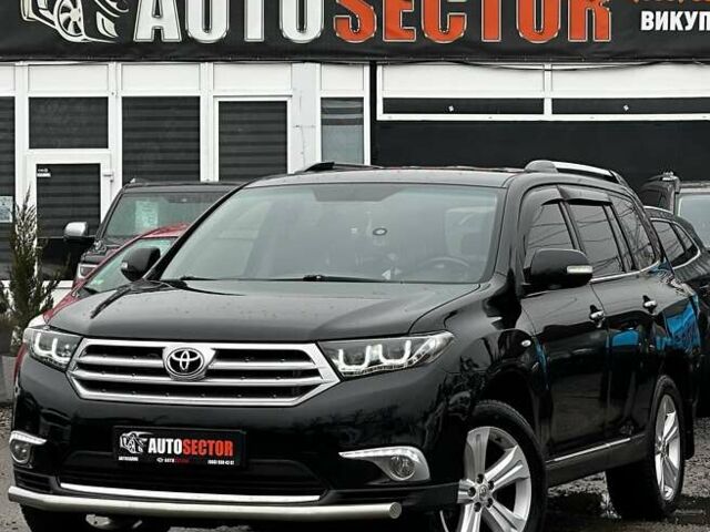 Черный Тойота Хайлендер, объемом двигателя 3.46 л и пробегом 198 тыс. км за 18500 $, фото 1 на Automoto.ua