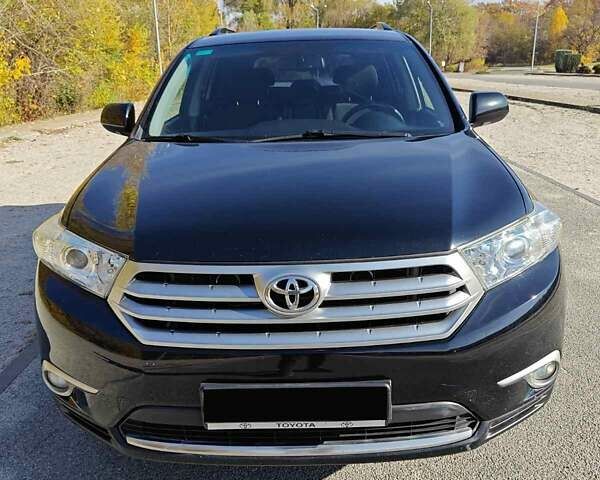 Черный Тойота Хайлендер, объемом двигателя 3.46 л и пробегом 188 тыс. км за 18000 $, фото 1 на Automoto.ua