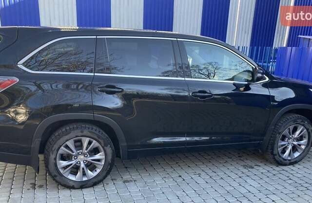 Черный Тойота Хайлендер, объемом двигателя 2.7 л и пробегом 128 тыс. км за 23500 $, фото 1 на Automoto.ua