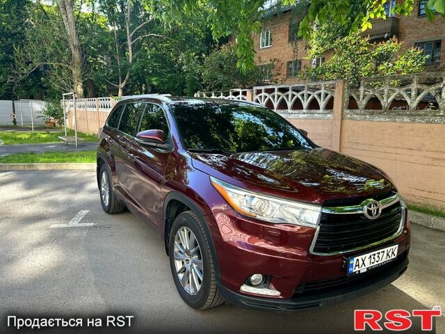 Красный Тойота Хайлендер, объемом двигателя 3.5 л и пробегом 215 тыс. км за 21000 $, фото 1 на Automoto.ua
