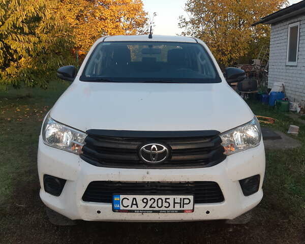 Білий Тойота Хайлюкс, об'ємом двигуна 2.39 л та пробігом 95 тис. км за 32500 $, фото 1 на Automoto.ua