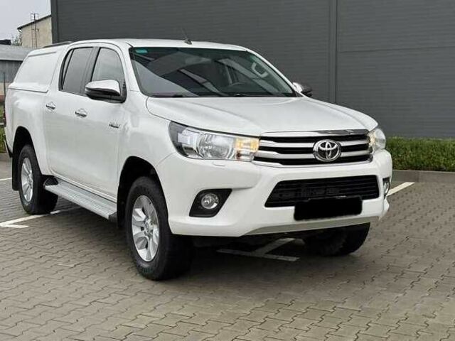 Білий Тойота Хайлюкс, об'ємом двигуна 2.39 л та пробігом 165 тис. км за 30500 $, фото 1 на Automoto.ua