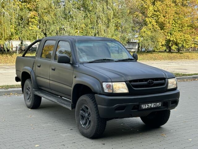 Чорний Тойота Хайлюкс, об'ємом двигуна 2.5 л та пробігом 200 тис. км за 5450 $, фото 1 на Automoto.ua