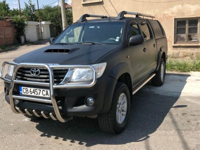 Черный Тойота Хайлюкс, объемом двигателя 3 л и пробегом 130 тыс. км за 4300 $, фото 1 на Automoto.ua