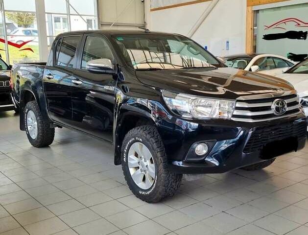 Черный Тойота Хайлюкс, объемом двигателя 2.8 л и пробегом 270 тыс. км за 23500 $, фото 1 на Automoto.ua