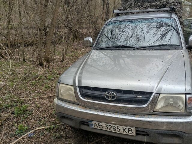 Сірий Тойота Хайлюкс, об'ємом двигуна 2.4 л та пробігом 350 тис. км за 6000 $, фото 1 на Automoto.ua
