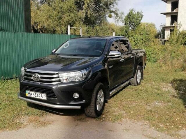 Серый Тойота Хайлюкс, объемом двигателя 2.4 л и пробегом 277 тыс. км за 20000 $, фото 1 на Automoto.ua