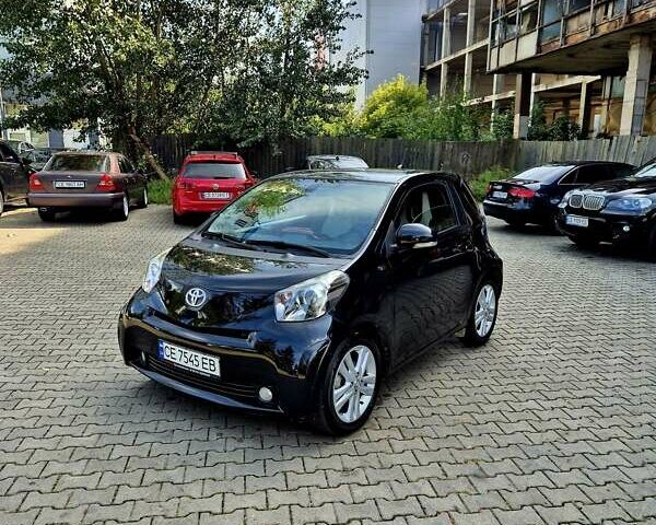 Черный Тойота АйКью, объемом двигателя 1.3 л и пробегом 149 тыс. км за 7500 $, фото 1 на Automoto.ua