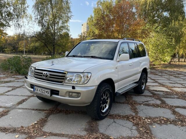 Білий Тойота Ленд Крузер 100, об'ємом двигуна 4.5 л та пробігом 330 тис. км за 15000 $, фото 1 на Automoto.ua