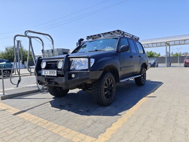 Черный Тойота Ленд Крузер 100, объемом двигателя 4.7 л и пробегом 300 тыс. км за 6000 $, фото 1 на Automoto.ua