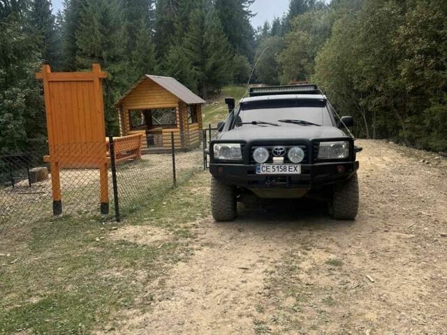 Чорний Тойота Ленд Крузер 100, об'ємом двигуна 4.2 л та пробігом 200 тис. км за 17500 $, фото 1 на Automoto.ua