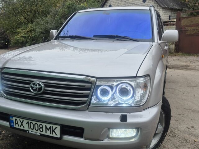 Серый Тойота Ленд Крузер 100, объемом двигателя 4.2 л и пробегом 437 тыс. км за 18800 $, фото 1 на Automoto.ua