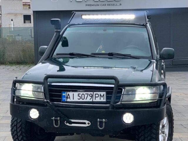 Зеленый Тойота Ленд Крузер 100, объемом двигателя 4.2 л и пробегом 460 тыс. км за 13999 $, фото 1 на Automoto.ua