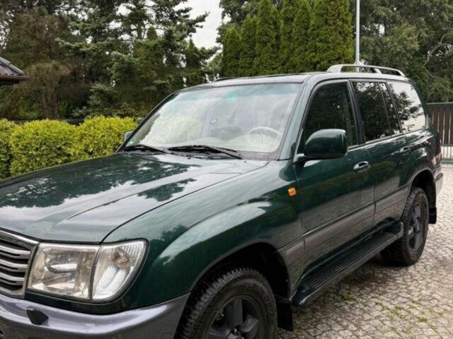 Зеленый Тойота Ленд Крузер 105, объемом двигателя 4.2 л и пробегом 265 тыс. км за 3300 $, фото 1 на Automoto.ua