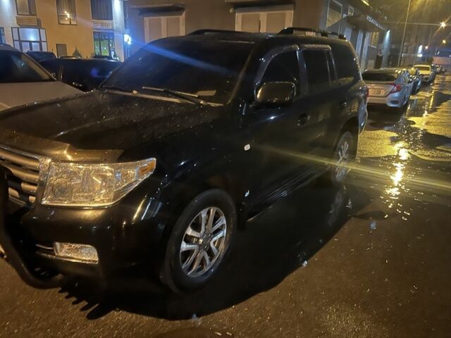 Черный Тойота Ленд Крузер 200, объемом двигателя 4.5 л и пробегом 371 тыс. км за 23000 $, фото 1 на Automoto.ua