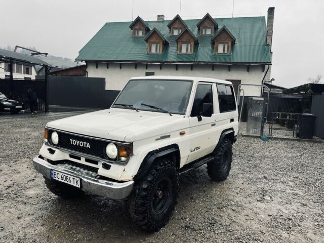 Белый Тойота Ленд Крузер 70, объемом двигателя 1.6 л и пробегом 270 тыс. км за 7000 $, фото 1 на Automoto.ua