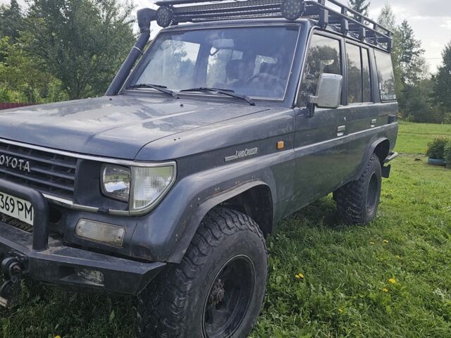 Синий Тойота Ленд Крузер 70, объемом двигателя 3 л и пробегом 205 тыс. км за 16000 $, фото 1 на Automoto.ua