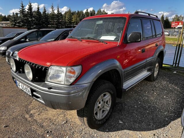 Красный Тойота Ленд Крузер 80, объемом двигателя 3 л и пробегом 240 тыс. км за 7000 $, фото 1 на Automoto.ua