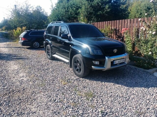 Черный Тойота Ленд Крузер Прадо 120, объемом двигателя 4 л и пробегом 257 тыс. км за 10000 $, фото 1 на Automoto.ua