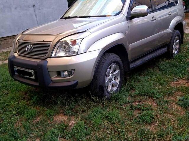 Бежевий Тойота Ленд Крузер Прадо, об'ємом двигуна 4 л та пробігом 330 тис. км за 13500 $, фото 1 на Automoto.ua