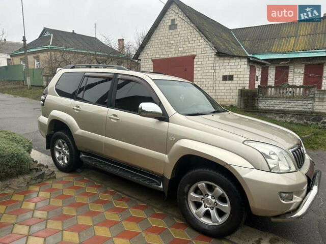 Бежевий Тойота Ленд Крузер Прадо, об'ємом двигуна 4 л та пробігом 322 тис. км за 11700 $, фото 1 на Automoto.ua