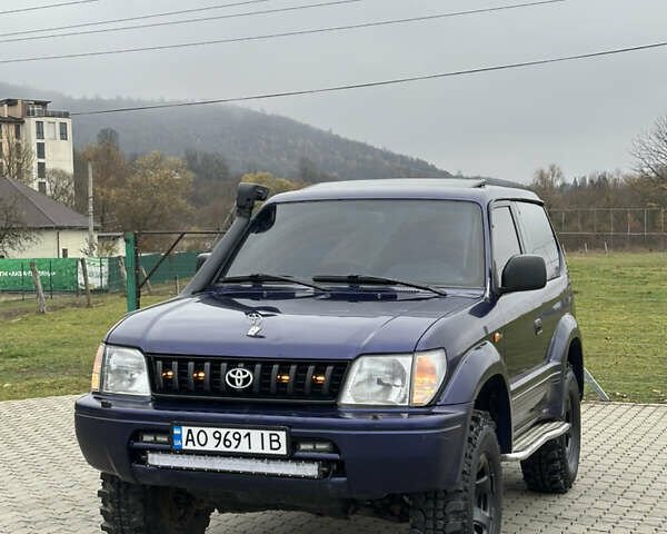 Синій Тойота Ленд Крузер Прадо, об'ємом двигуна 3.38 л та пробігом 410 тис. км за 12500 $, фото 1 на Automoto.ua
