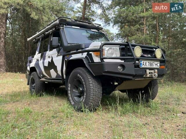 Белый Тойота Ленд Крузер, объемом двигателя 4.2 л и пробегом 137 тыс. км за 44900 $, фото 1 на Automoto.ua