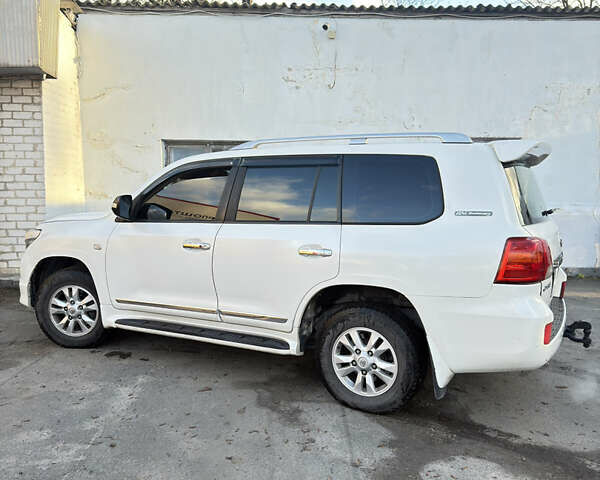 Белый Тойота Ленд Крузер, объемом двигателя 4 л и пробегом 370 тыс. км за 22000 $, фото 1 на Automoto.ua