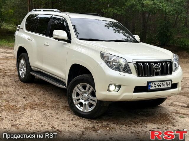 Белый Тойота Ленд Крузер, объемом двигателя 4 л и пробегом 210 тыс. км за 30000 $, фото 1 на Automoto.ua