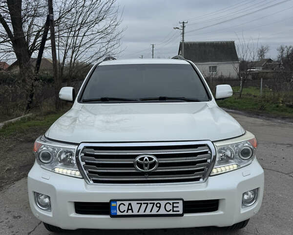 Білий Тойота Ленд Крузер, об'ємом двигуна 4.5 л та пробігом 230 тис. км за 29500 $, фото 1 на Automoto.ua