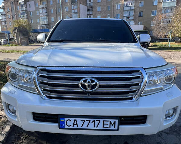 Білий Тойота Ленд Крузер, об'ємом двигуна 4.46 л та пробігом 265 тис. км за 25000 $, фото 1 на Automoto.ua