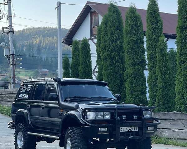 Чорний Тойота Ленд Крузер, об'ємом двигуна 4.2 л та пробігом 235 тис. км за 18950 $, фото 1 на Automoto.ua