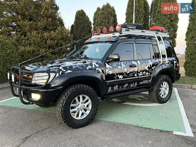Черный Тойота Ленд Крузер, объемом двигателя 4.7 л и пробегом 430 тыс. км за 25000 $, фото 1 на Automoto.ua