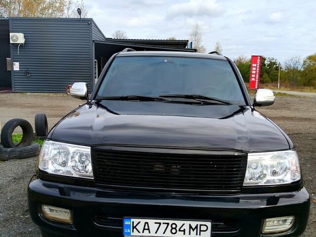 Черный Тойота Ленд Крузер, объемом двигателя 4.7 л и пробегом 493 тыс. км за 14000 $, фото 1 на Automoto.ua