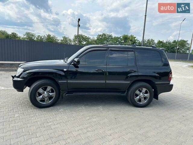 Черный Тойота Ленд Крузер, объемом двигателя 4.7 л и пробегом 286 тыс. км за 16000 $, фото 1 на Automoto.ua