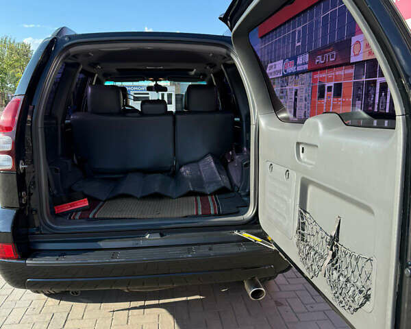 Черный Тойота Ленд Крузер, объемом двигателя 3.96 л и пробегом 430 тыс. км за 13000 $, фото 1 на Automoto.ua