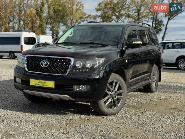 Черный Тойота Ленд Крузер, объемом двигателя 4.66 л и пробегом 329 тыс. км за 21000 $, фото 1 на Automoto.ua