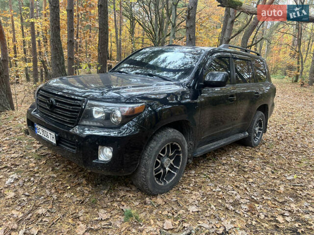 Черный Тойота Ленд Крузер, объемом двигателя 4.66 л и пробегом 295 тыс. км за 19900 $, фото 1 на Automoto.ua