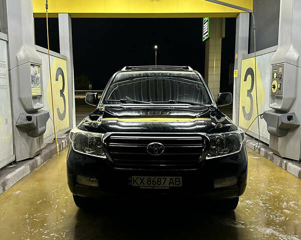 Чорний Тойота Ленд Крузер, об'ємом двигуна 5.66 л та пробігом 289 тис. км за 25000 $, фото 1 на Automoto.ua