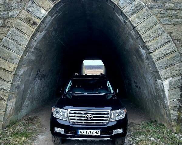 Чорний Тойота Ленд Крузер, об'ємом двигуна 4.7 л та пробігом 198 тис. км за 30000 $, фото 1 на Automoto.ua