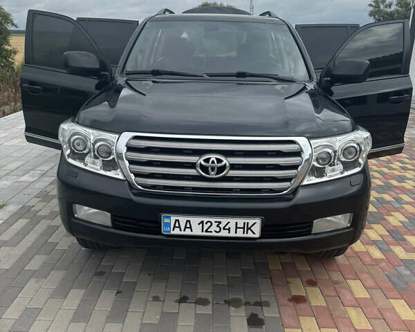 Чорний Тойота Ленд Крузер, об'ємом двигуна 4.46 л та пробігом 390 тис. км за 27000 $, фото 1 на Automoto.ua